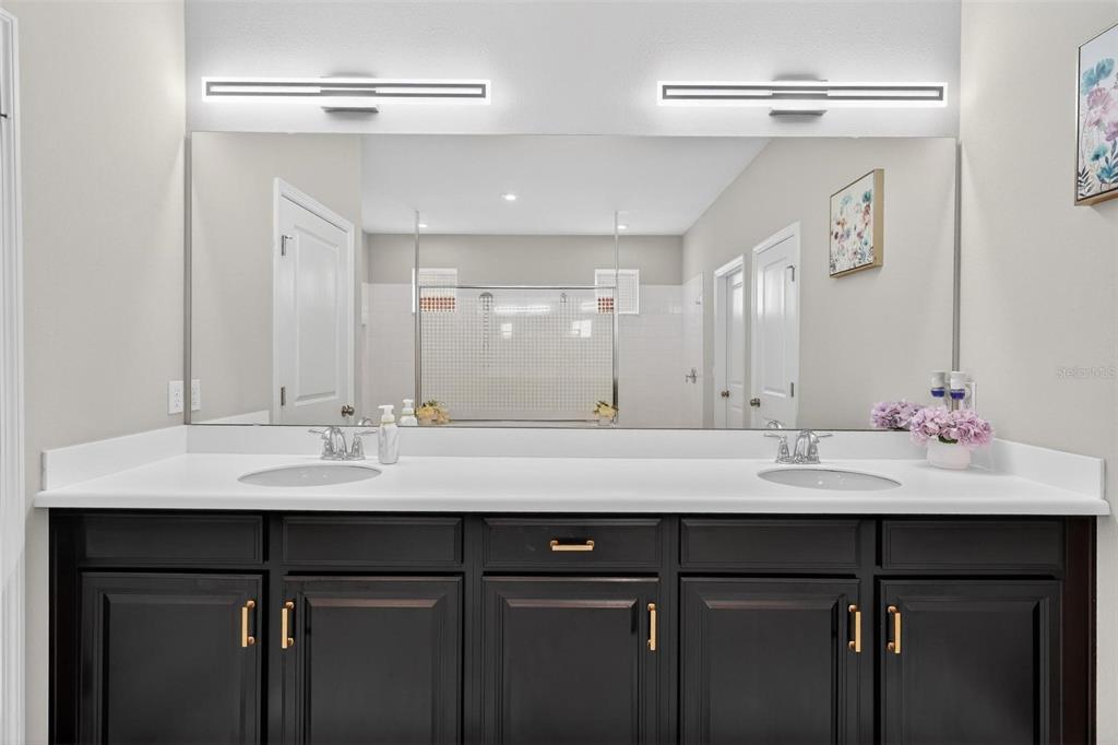 1235 Waterview Ridge Circle Apopka, FL 32703 - Photo 34 of 82 a bathroom with a double vanity sink mirror and