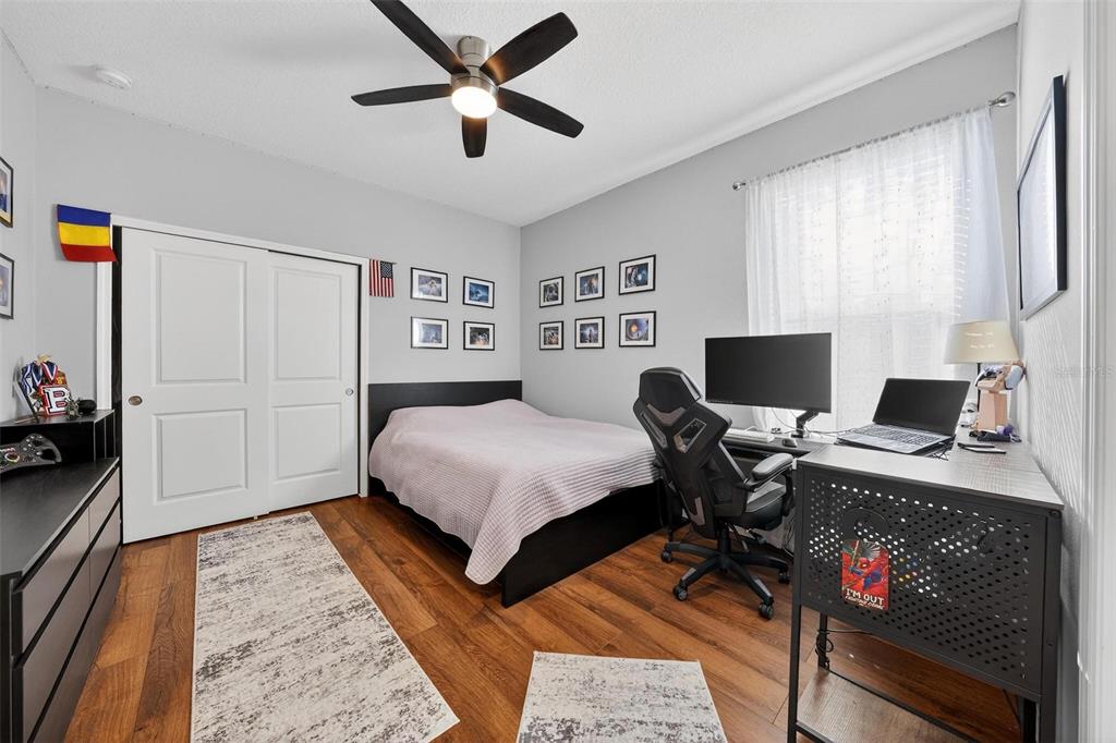 1235 Waterview Ridge Circle Apopka, FL 32703 - Photo 38 of 82 a bedroom with a workspace