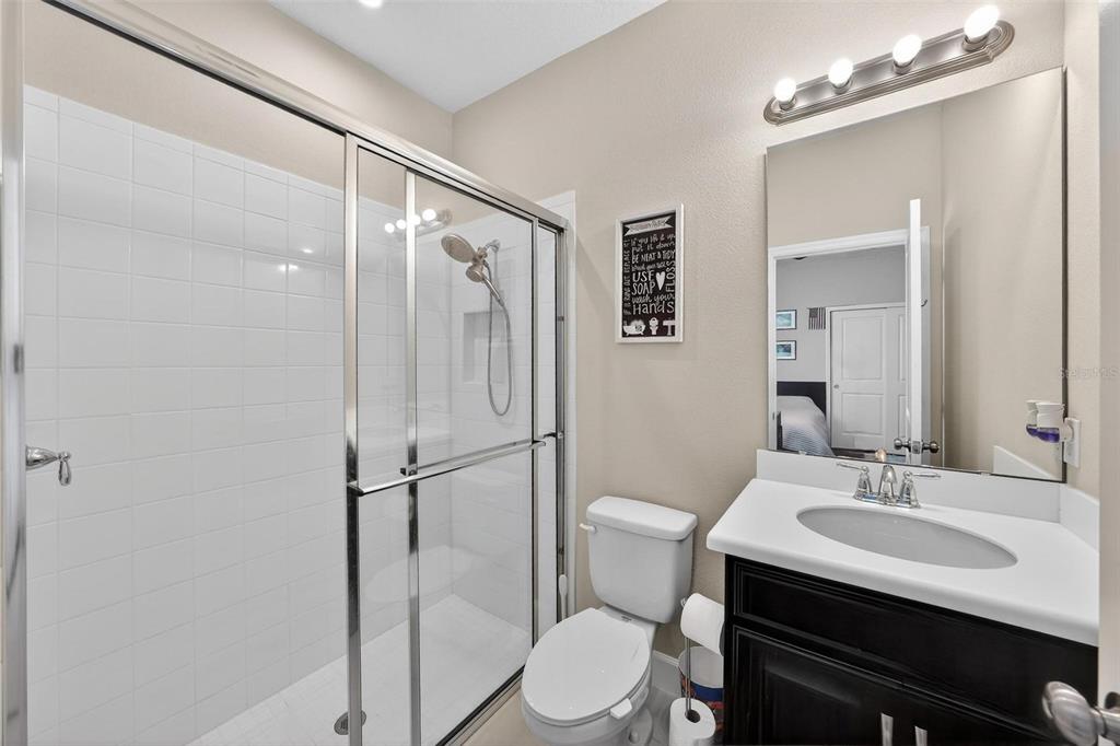 1235 Waterview Ridge Circle Apopka, FL 32703 - Photo 40 of 82 a bathroom with a sink toilet and shower