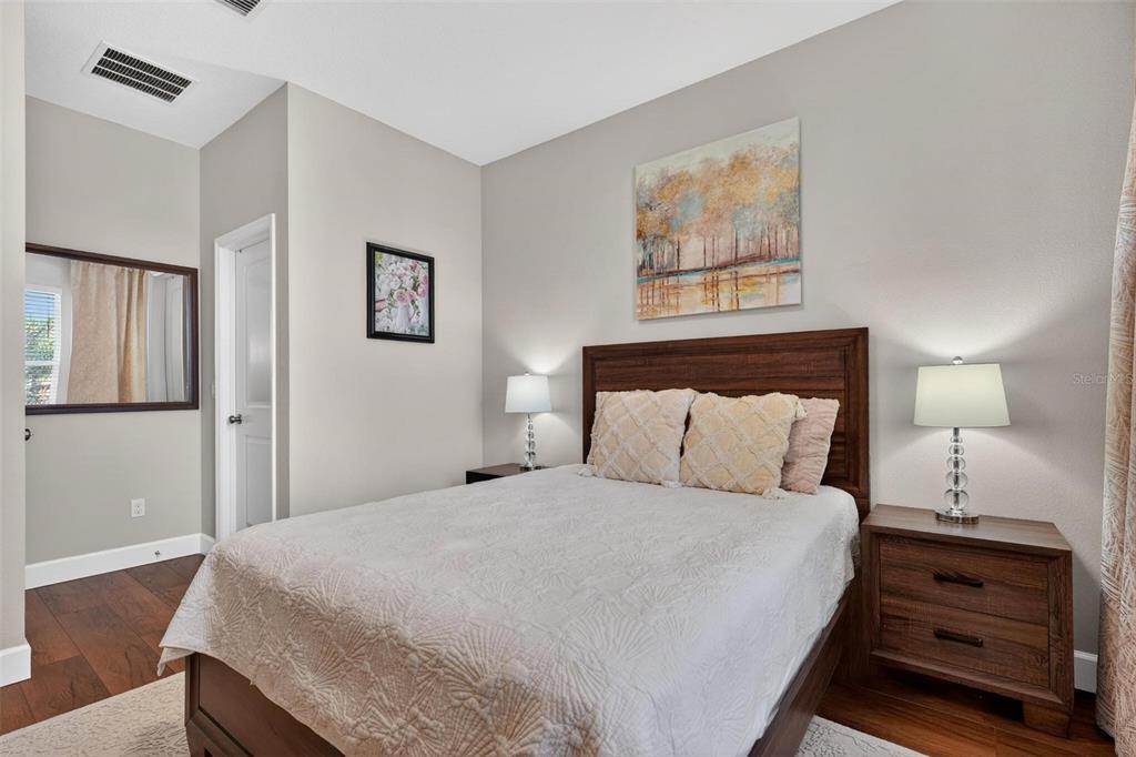 1235 Waterview Ridge Circle Apopka, FL 32703 - Photo 44 of 82 a bed room with a bed and a night stand