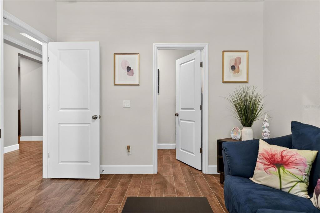 1235 Waterview Ridge Circle Apopka, FL 32703 - Photo 48 of 82 a view of an empty room and wooden floor