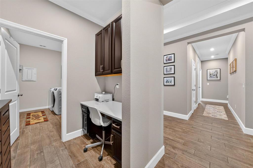 1235 Waterview Ridge Circle Apopka, FL 32703 - Photo 51 of 82 a view of a workspace with furniture and wooden floor