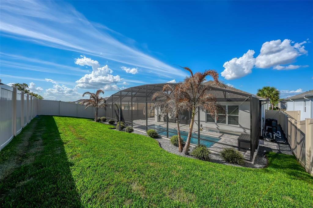 1235 Waterview Ridge Circle Apopka, FL 32703 - Photo 62 of 82 a view of a house with a backyard porch and sitting area