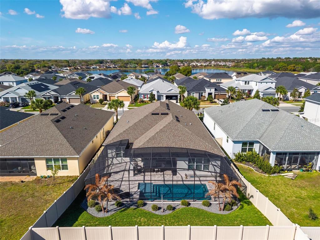 1235 Waterview Ridge Circle Apopka, FL 32703 - Photo 65 of 82 an aerial view of residential houses with outdoor space and swimming pool