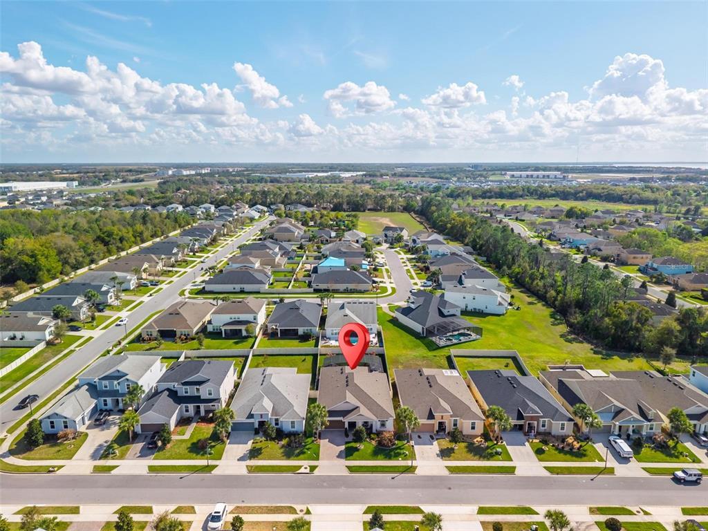 1235 Waterview Ridge Circle Apopka, FL 32703 - Photo 69 of 82 an aerial view of residential houses with outdoor space and ocean view