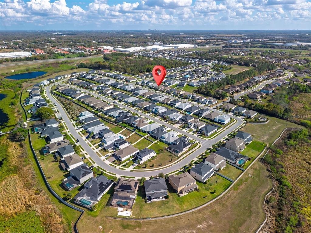 1235 Waterview Ridge Circle Apopka, FL 32703 - Photo 70 of 82 an aerial view of a residential building and lake view