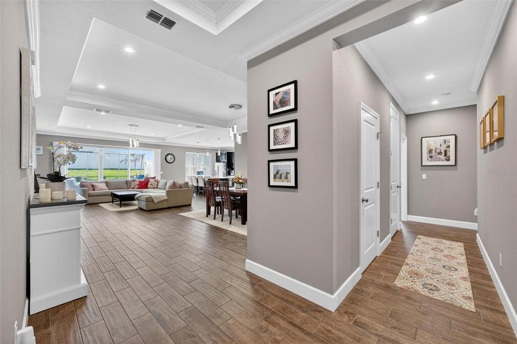 1235 Waterview Ridge Circle Apopka, FL 32703 - Photo 10 of 82 a living room with furniture and a wooden floor