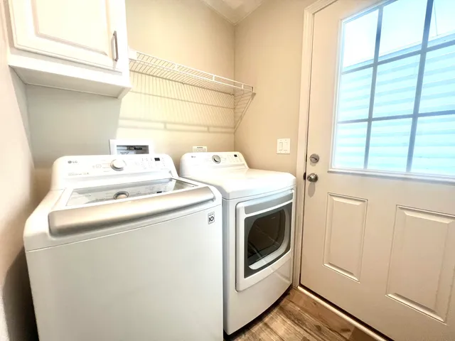 a utility room with dryer and washer