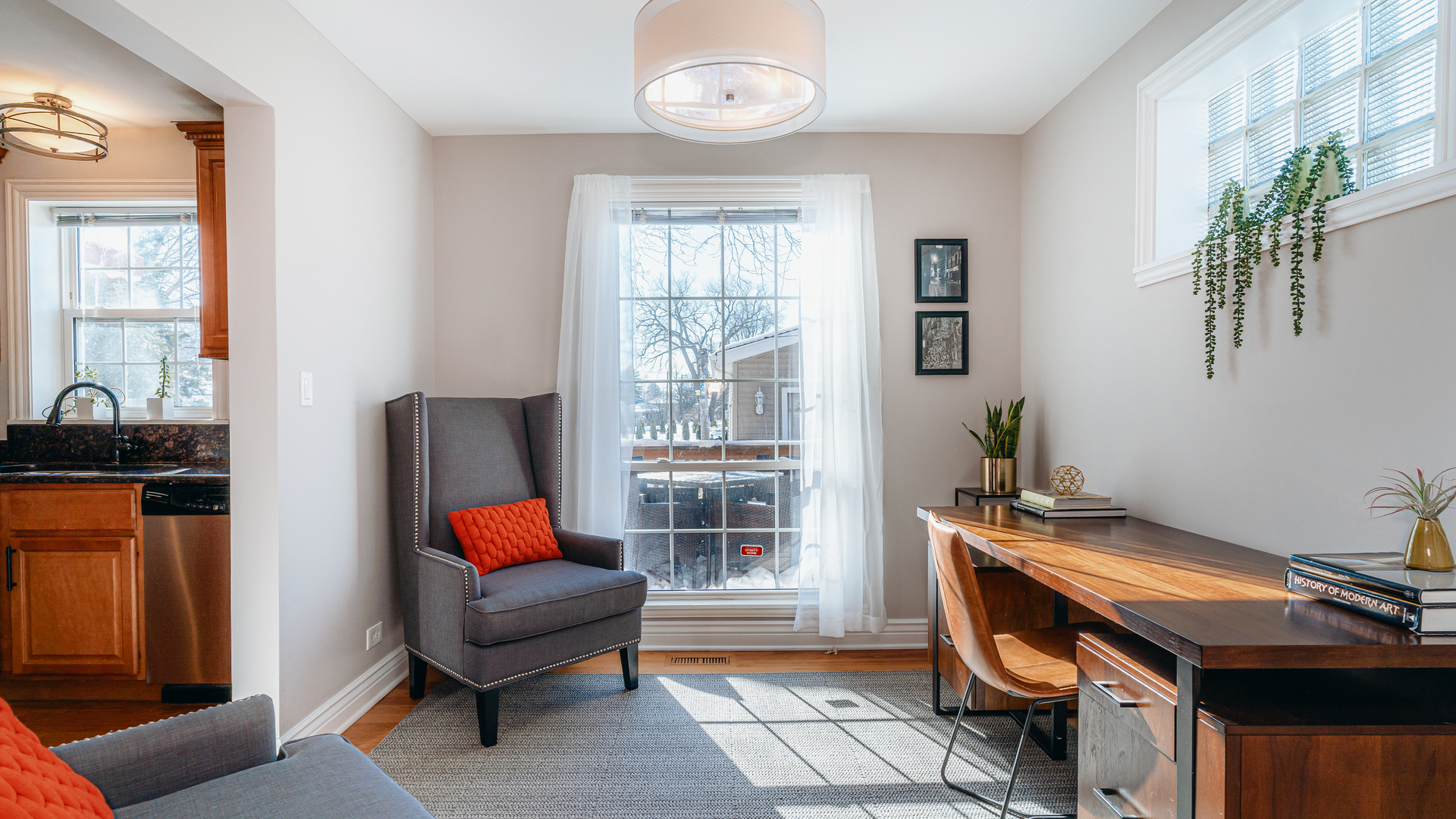 241 Devon Avenue Park Ridge, IL 60068 - Photo 15 of 46 a living room with furniture a ceiling fan and a window