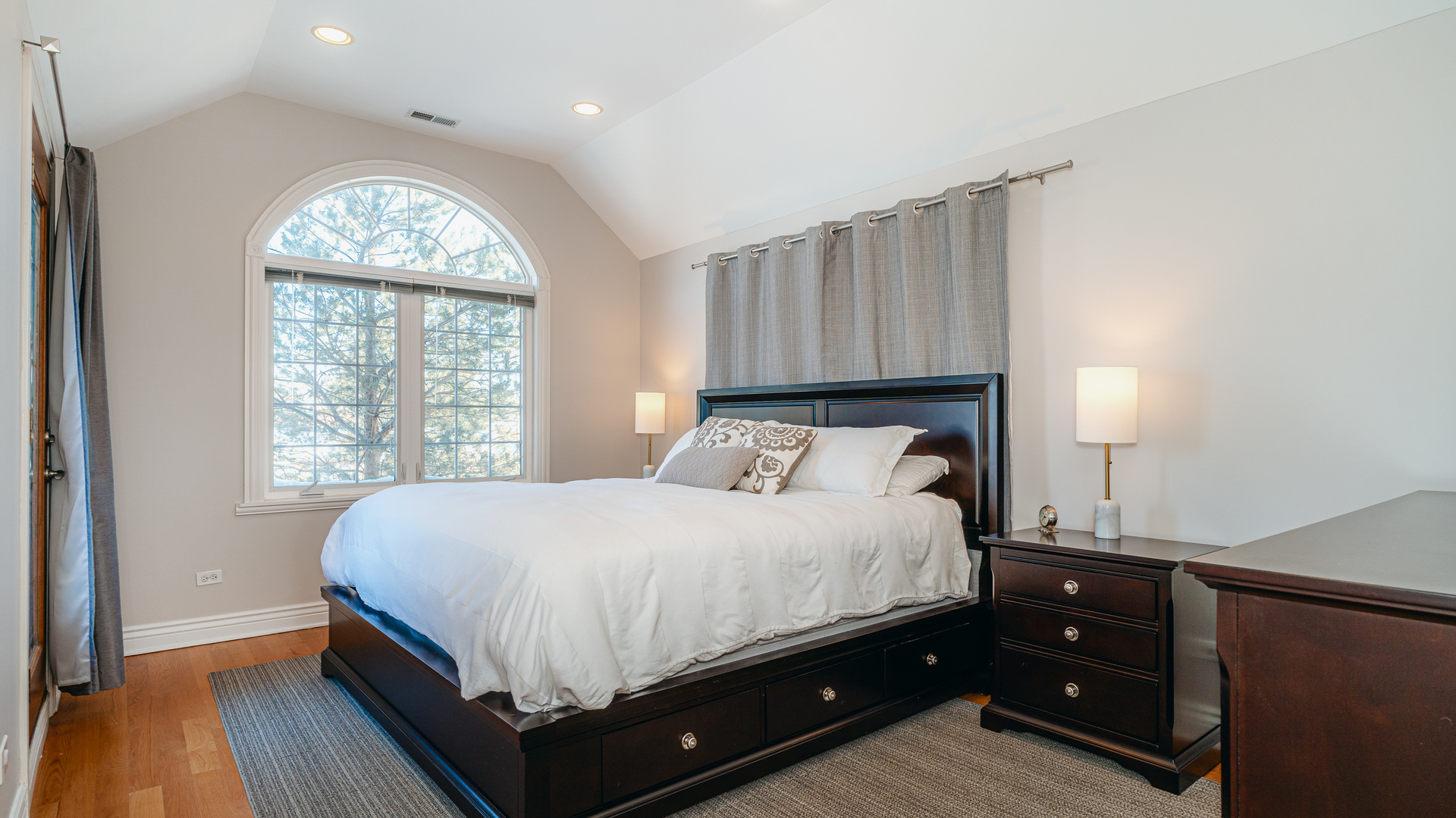 241 Devon Avenue Park Ridge, IL 60068 - Photo 19 of 46 a bedroom with a bed and a window