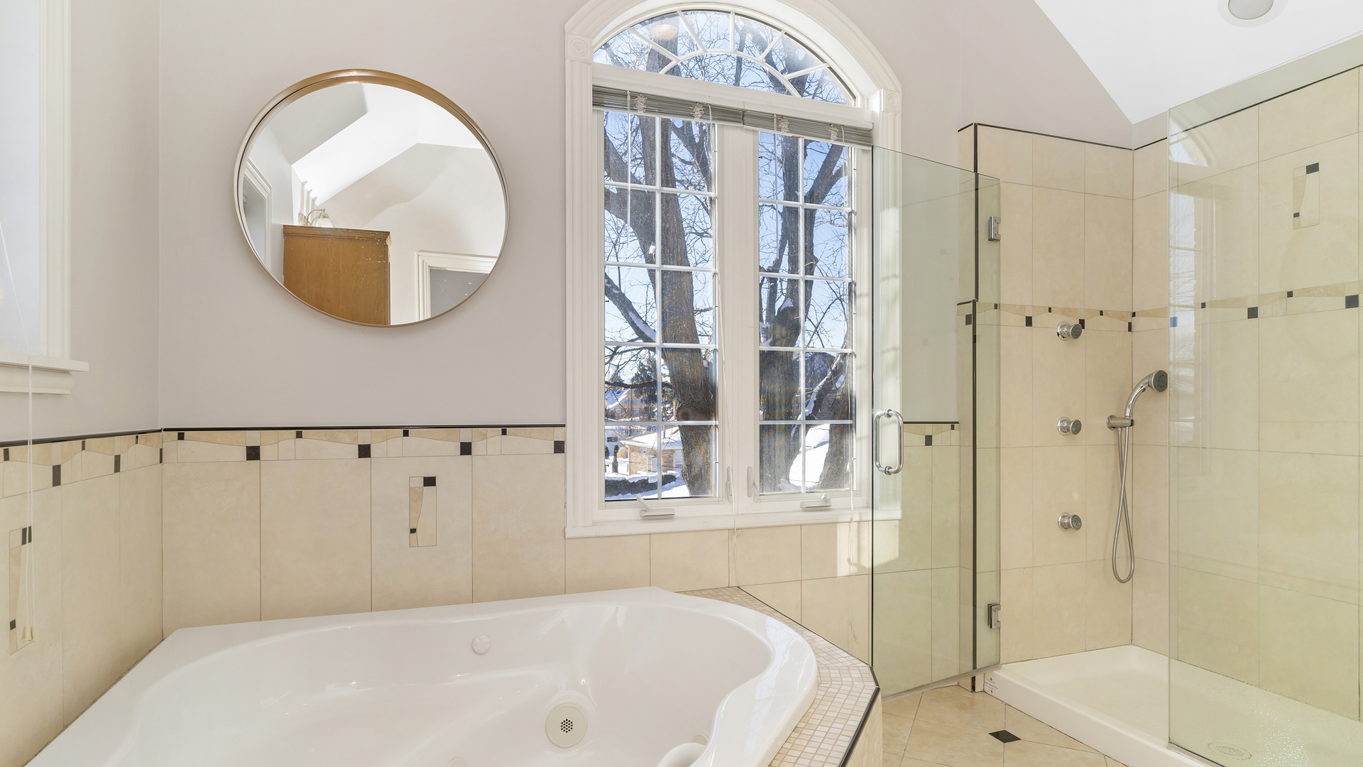 241 Devon Avenue Park Ridge, IL 60068 - Photo 23 of 46 a bathroom with a bathtub and a shower