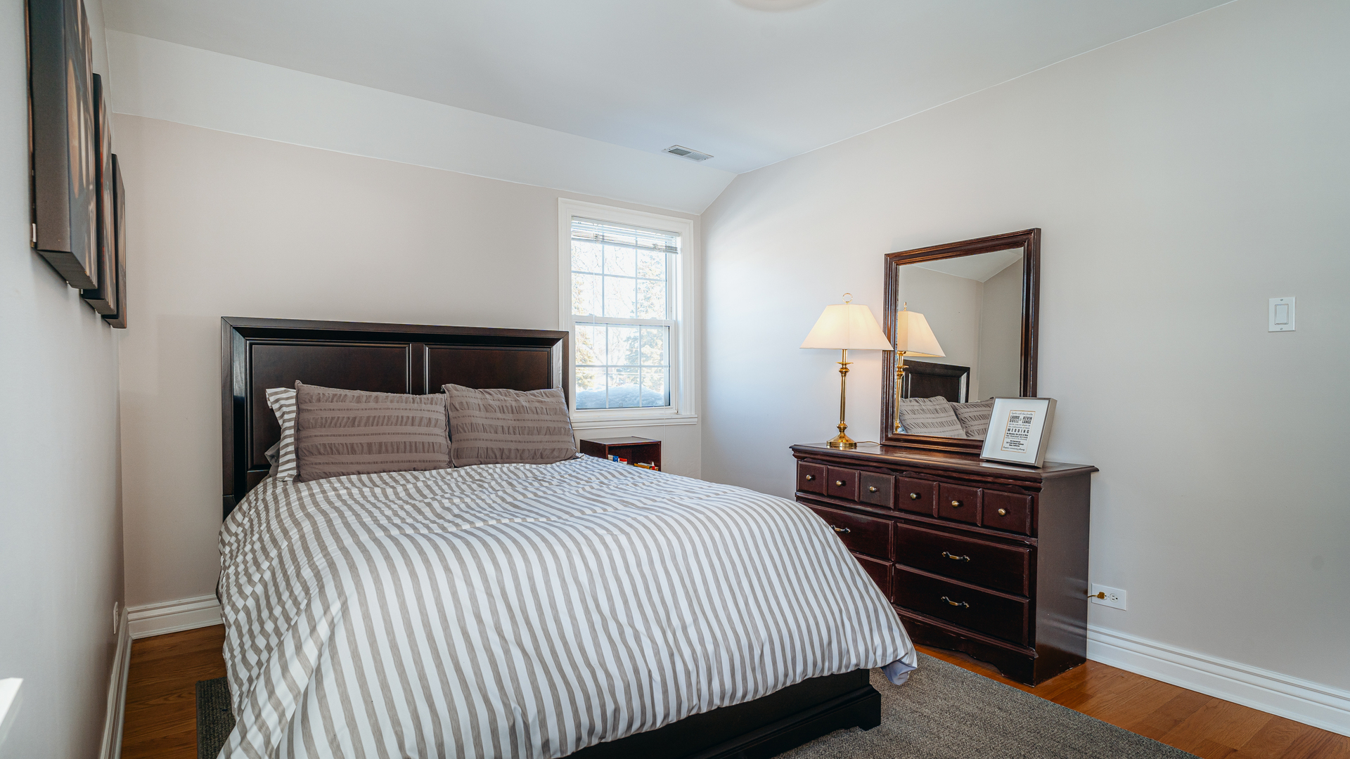 241 Devon Avenue Park Ridge, IL 60068 - Photo 26 of 46 a bedroom with a bed and a dresser