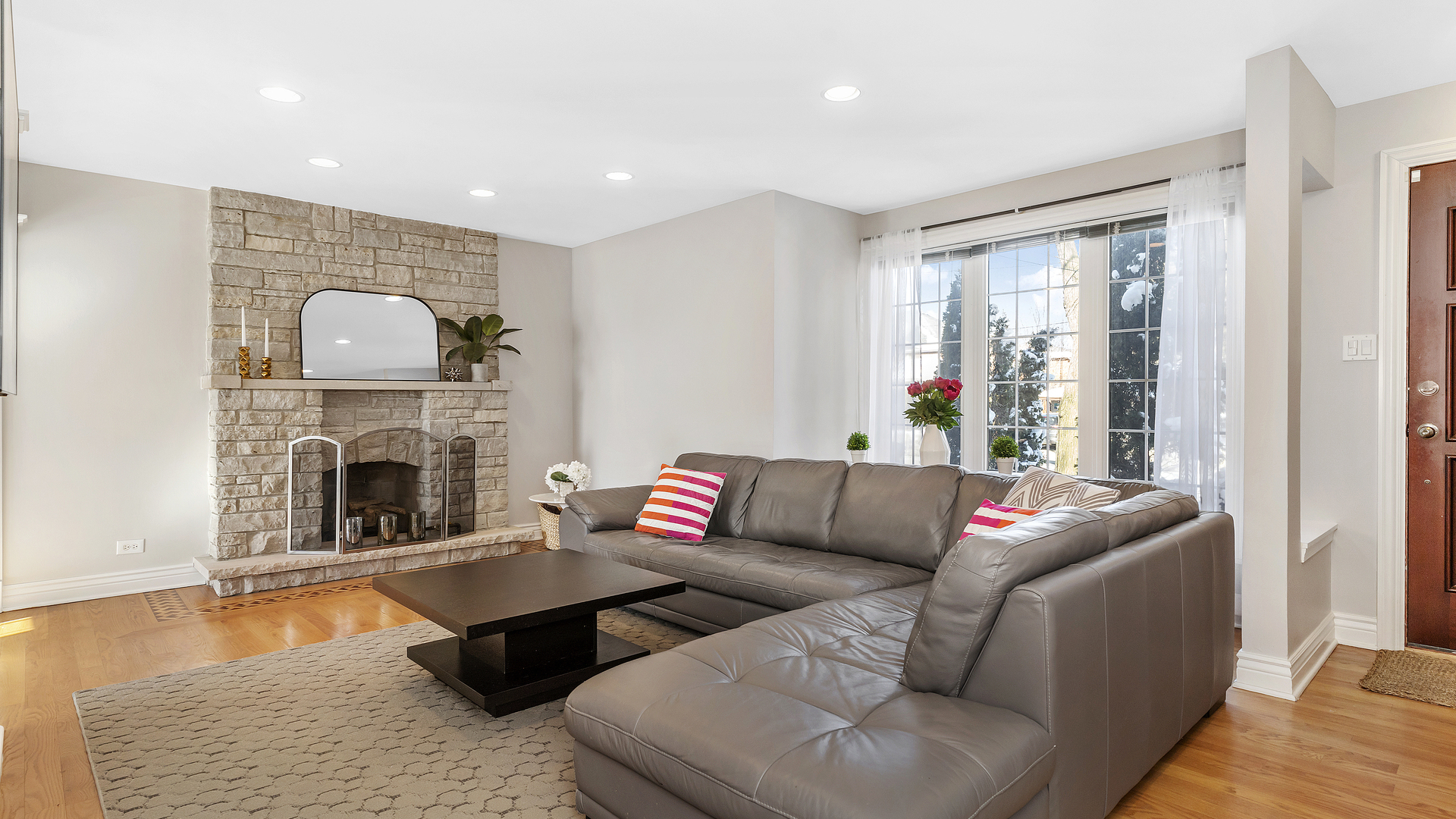 241 Devon Avenue Park Ridge, IL 60068 - Photo 4 of 46 a living room with furniture and a fireplace