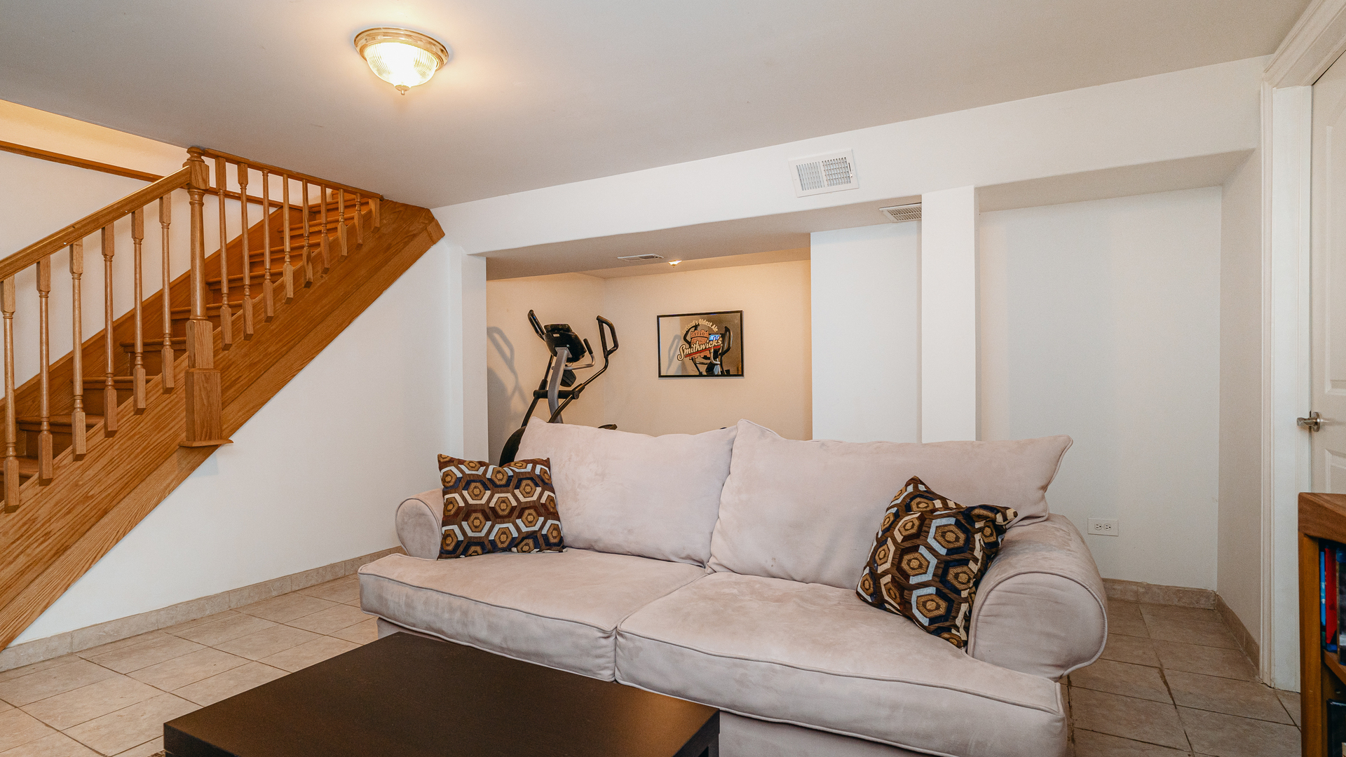 241 Devon Avenue Park Ridge, IL 60068 - Photo 33 of 46 a living room with furniture and stairs
