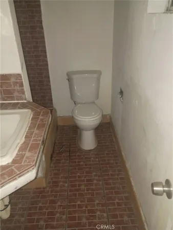 a bathroom with a toilet