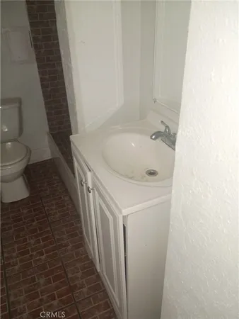 a bathroom with a sink and a toilet