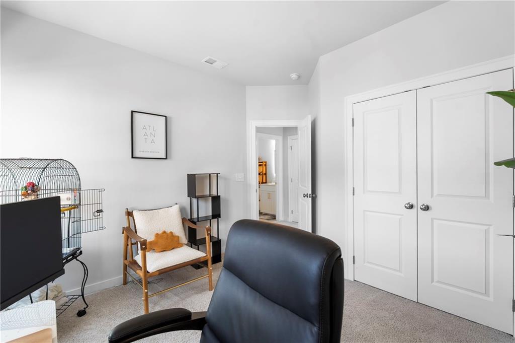 1320 Stanley Park Drive, Unit 141 Decatur, GA 30033 - Photo 30 of 71 a view of a livingroom with workspace and a couch