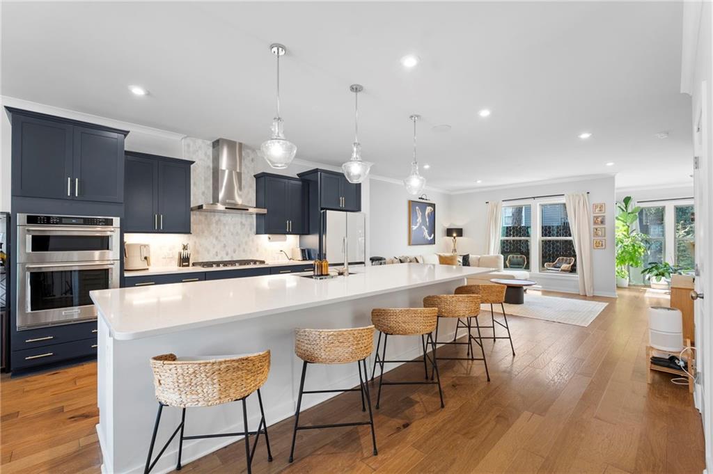 1320 Stanley Park Drive, Unit 141 Decatur, GA 30033 - Photo 3 of 71 a large kitchen with a table and chairs