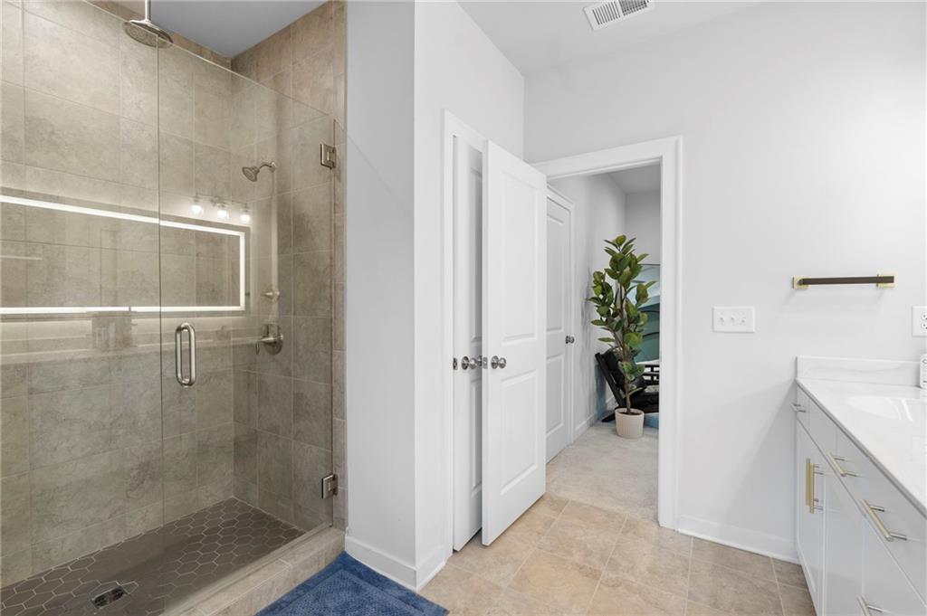 1320 Stanley Park Drive, Unit 141 Decatur, GA 30033 - Photo 37 of 71 a bathroom with a shower and a sink