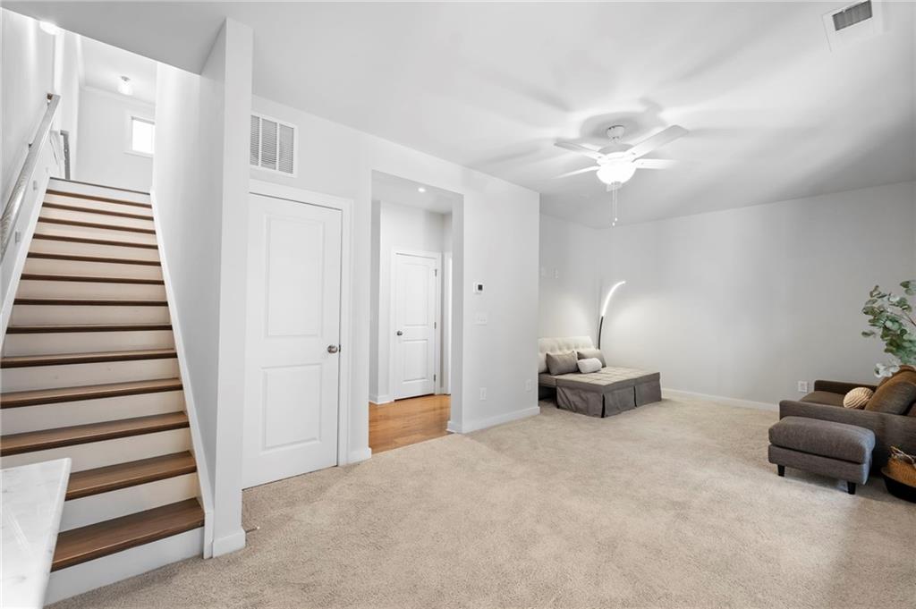 1320 Stanley Park Drive, Unit 141 Decatur, GA 30033 - Photo 39 of 71 wooden floor in an empty room with a window