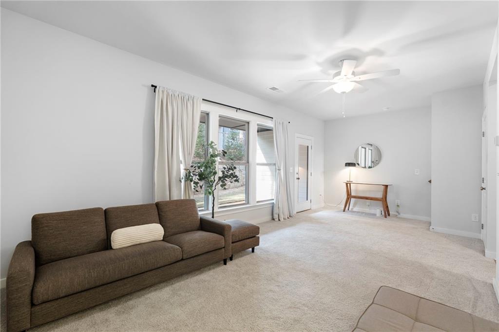 1320 Stanley Park Drive, Unit 141 Decatur, GA 30033 - Photo 41 of 71 a living room with furniture and a large window