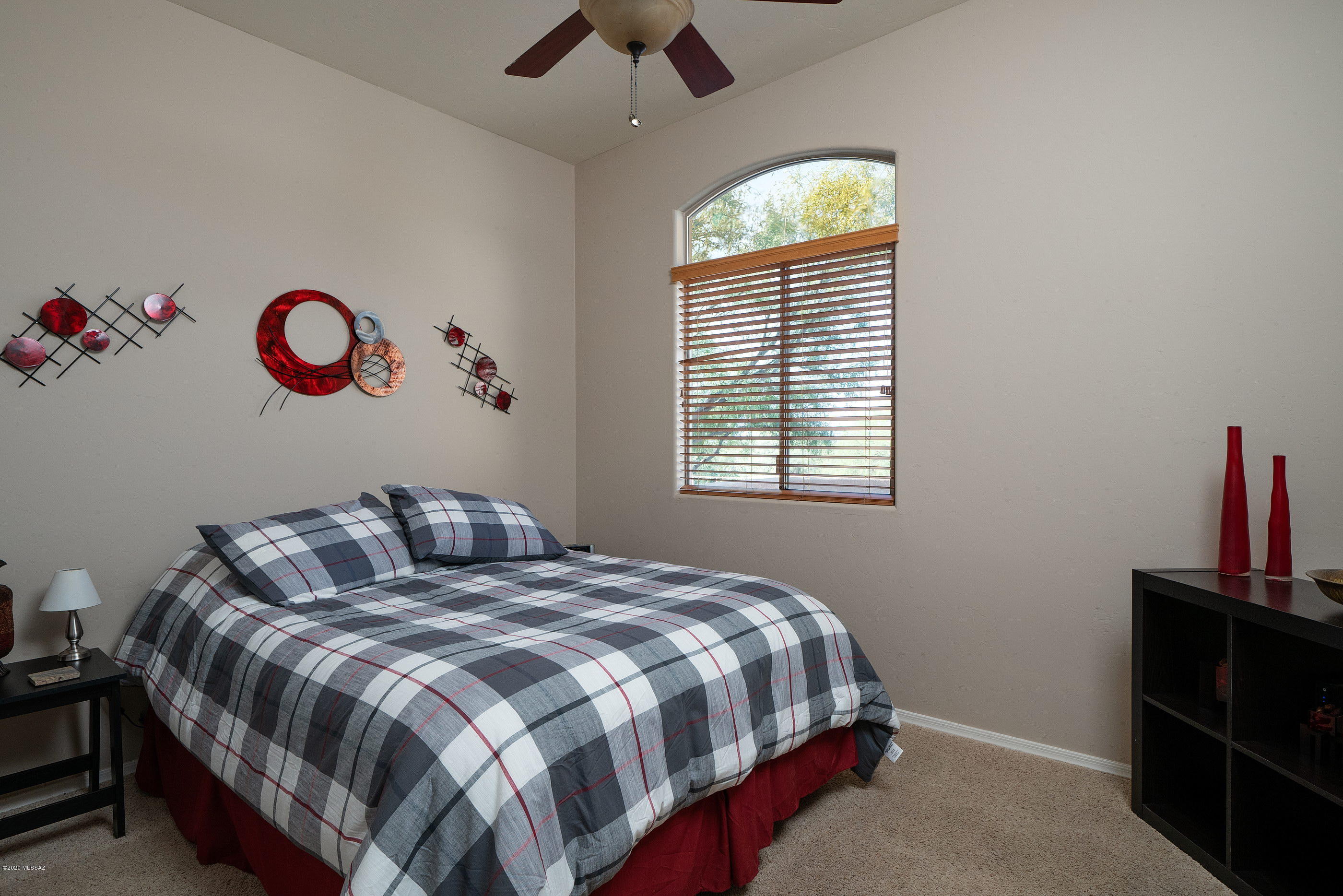 4440 West Crystal Ranch Place Marana, AZ 85658 - Photo 21 of 28 a bedroom with a bed and a window