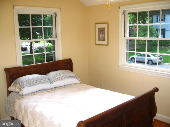9919 Big Rock Road Silver Spring, MD 20901 - Photo 13 of 23 a bedroom with a bed and a window