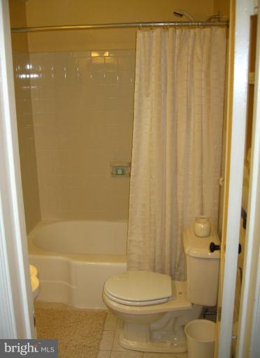 9919 Big Rock Road Silver Spring, MD 20901 - Photo 14 of 23 a bathroom with a shower and a toilet