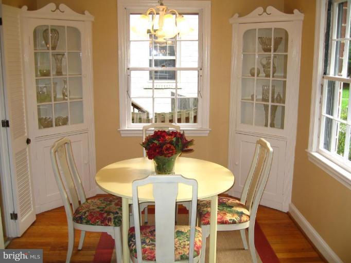 9919 Big Rock Road Silver Spring, MD 20901 - Photo 3 of 23 a view of a dining room with furniture and window