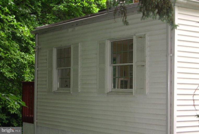 9919 Big Rock Road Silver Spring, MD 20901 - Photo 22 of 23 a front view of a house with a window
