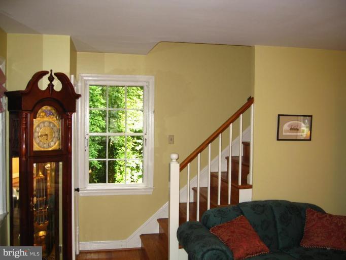 9919 Big Rock Road Silver Spring, MD 20901 - Photo 5 of 23 a view of entryway livingroom and hall with wooden floor
