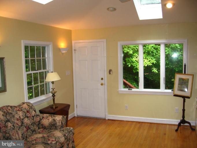 9919 Big Rock Road Silver Spring, MD 20901 - Photo 8 of 23 a living room with furniture and a window