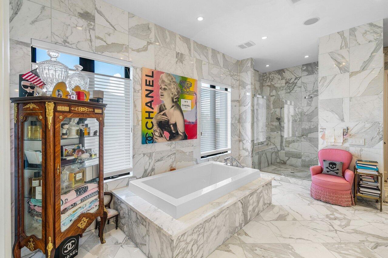 7172 Valencia Drive Boca Raton, FL 33433 - Photo 24 of 49 a spacious bathroom with a sink mirror and vanity