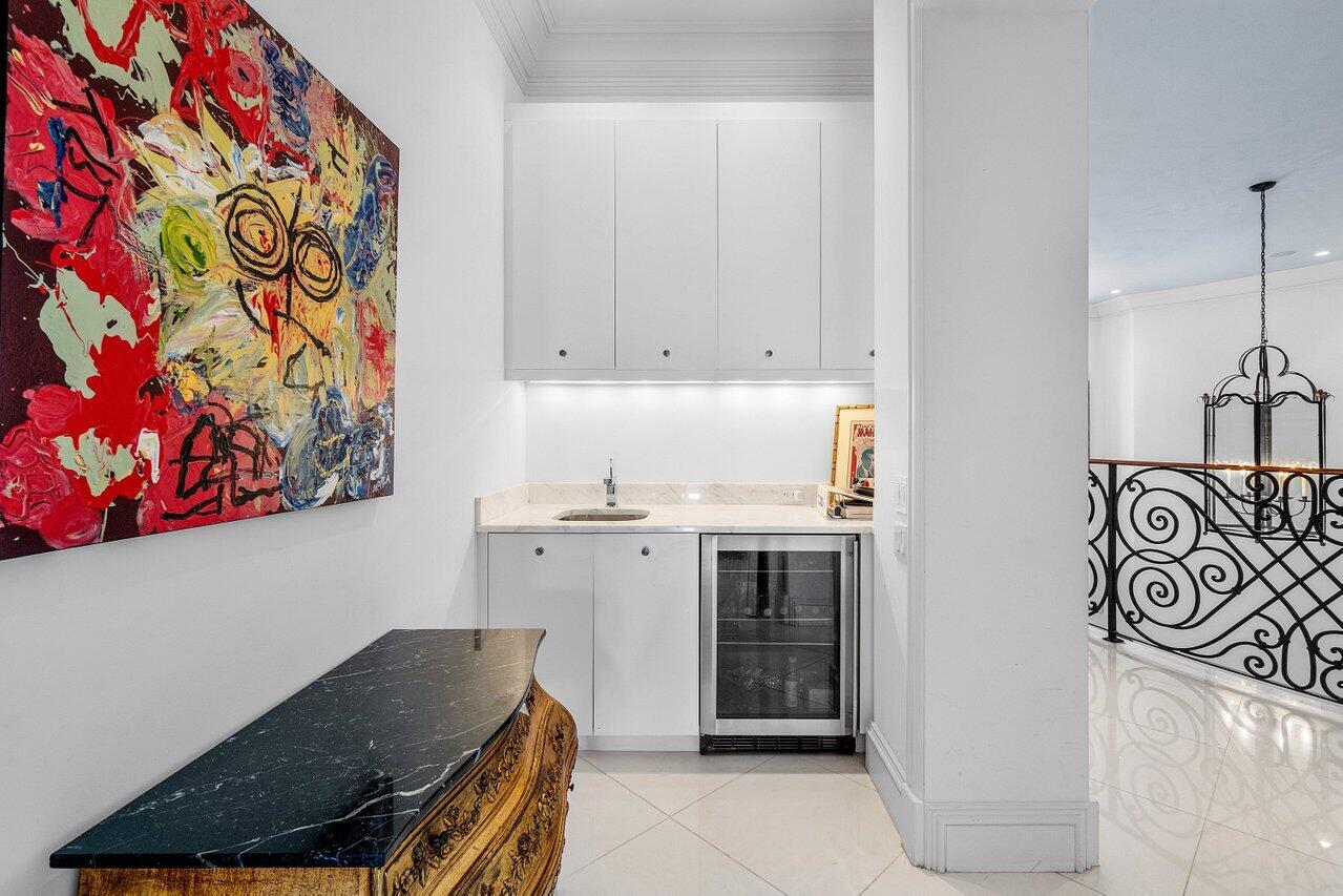 7172 Valencia Drive Boca Raton, FL 33433 - Photo 28 of 49 a kitchen with stainless steel appliances granite countertop a stove and a sink