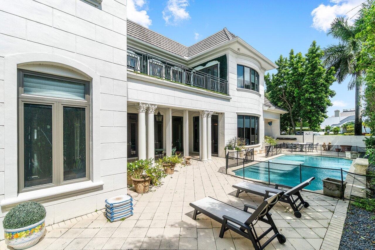 7172 Valencia Drive Boca Raton, FL 33433 - Photo 39 of 49 a view of a house with backyard sitting area and garden