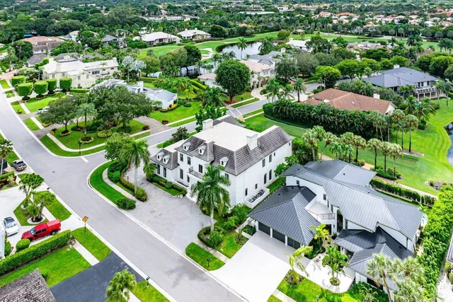 an aerial view of a house with a garden and plants