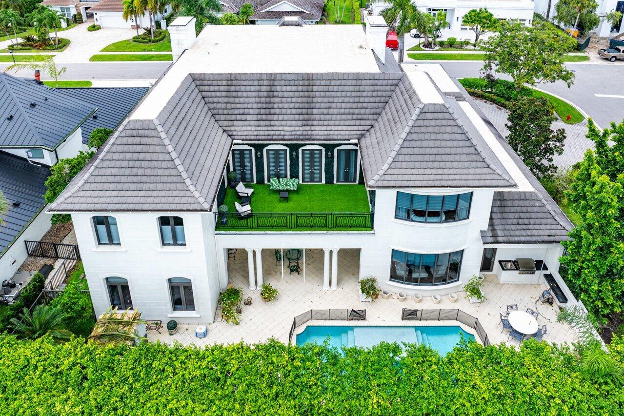 7172 Valencia Drive Boca Raton, FL 33433 - Photo 45 of 49 a view of a house with backyard and sitting area