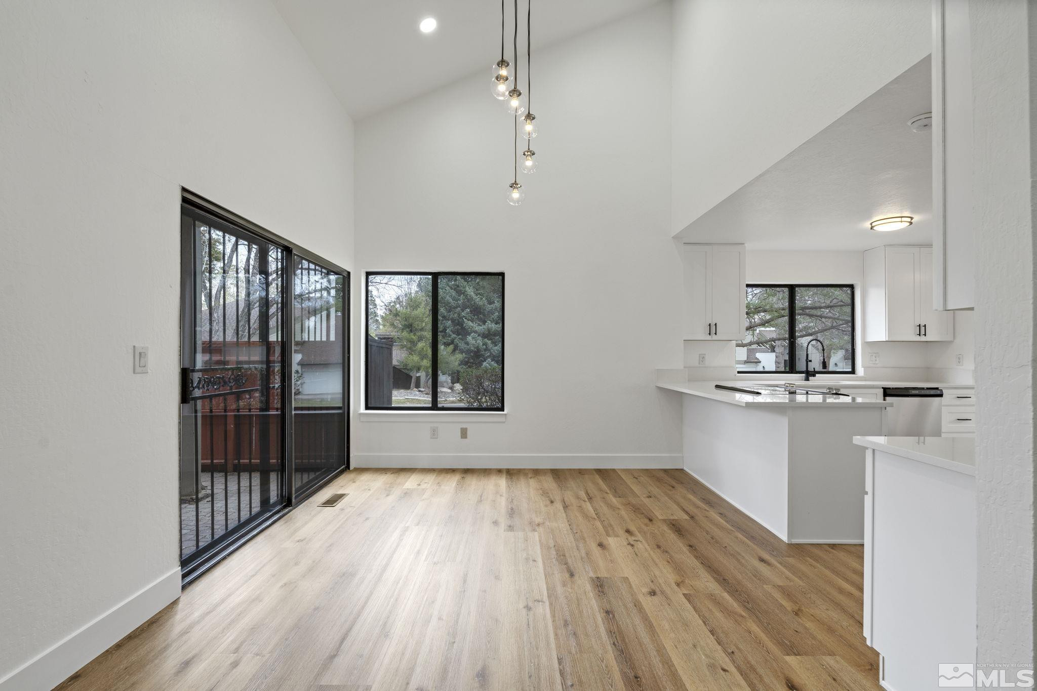 445 Anne Marie Court Reno, NV 89509 - Photo 15 of 27 a view of kitchen with wooden floor and electronic appliances