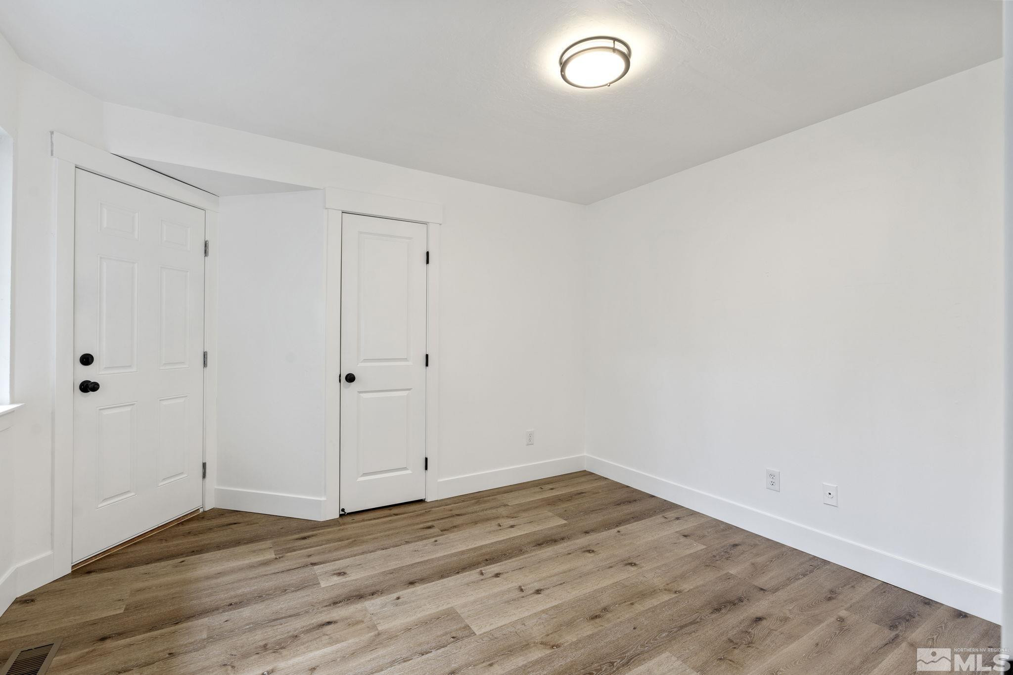 445 Anne Marie Court Reno, NV 89509 - Photo 7 of 27 a view of a room with wooden floor