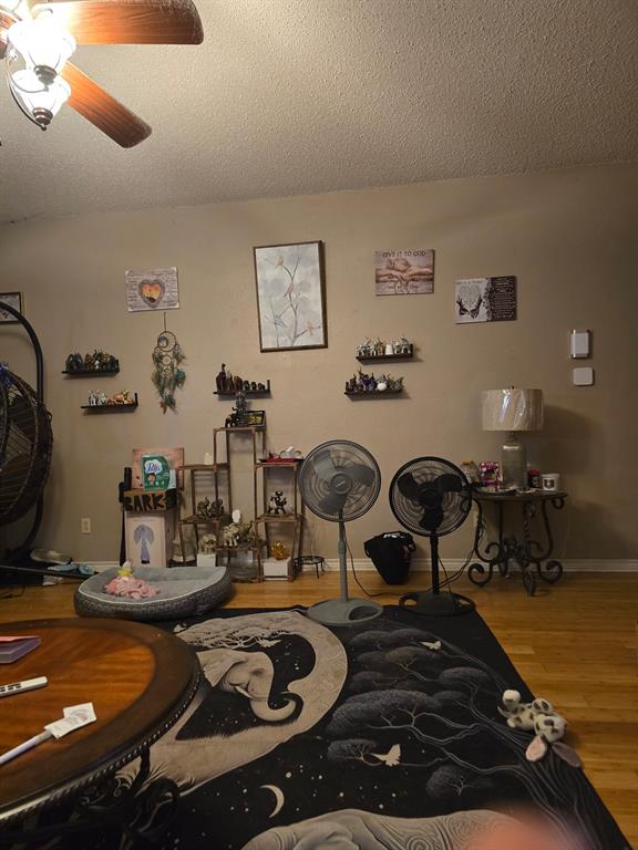 415 Ingred Street Waco, TX 76705 - Photo 5 of 8 a room with gym equipment and view of living room