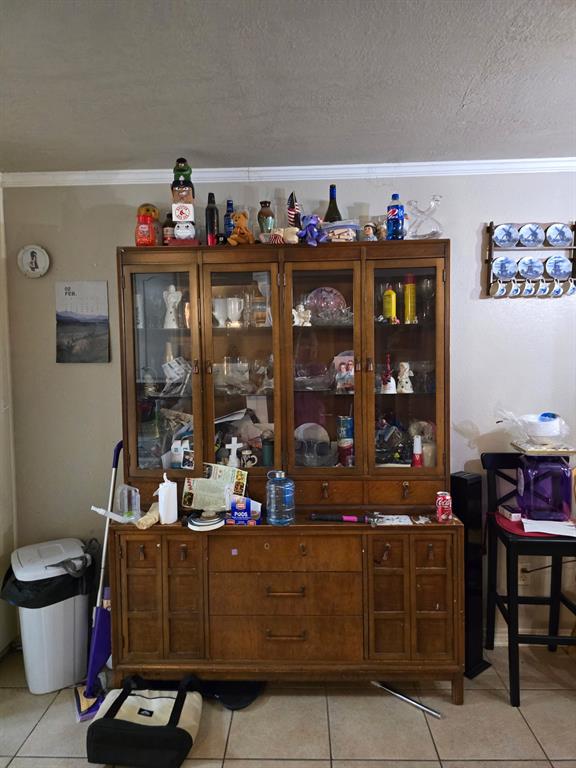 415 Ingred Street Waco, TX 76705 - Photo 6 of 8 a room with lots of wooden furniture