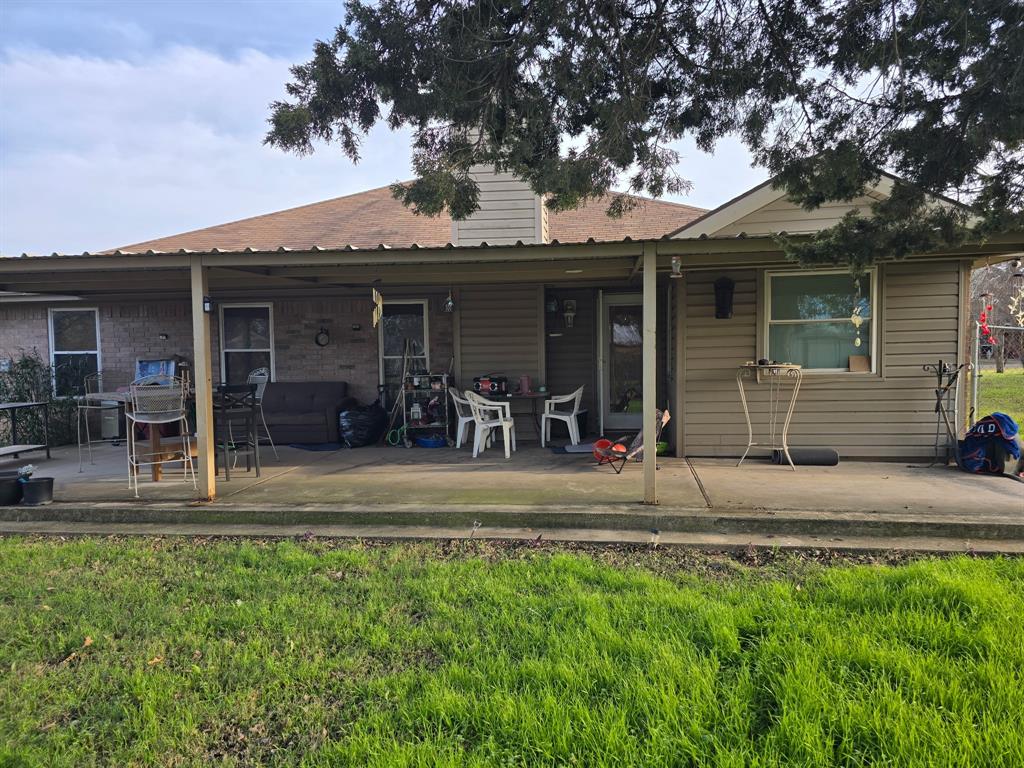 415 Ingred Street Waco, TX 76705 - Photo 8 of 8 a view of a house with a porch and a large tree