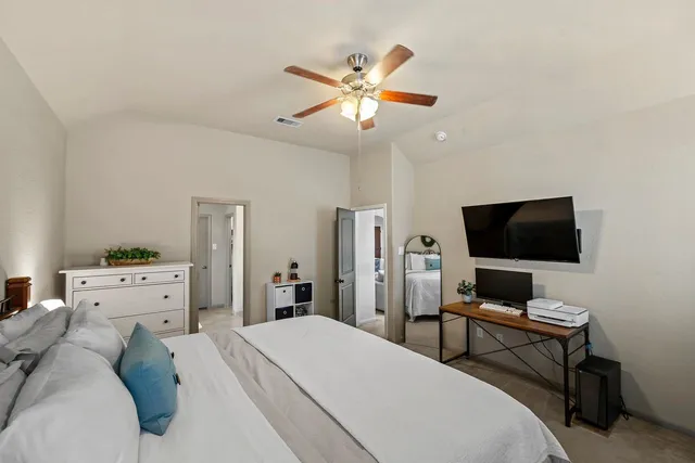a bathroom with a sink and glass door