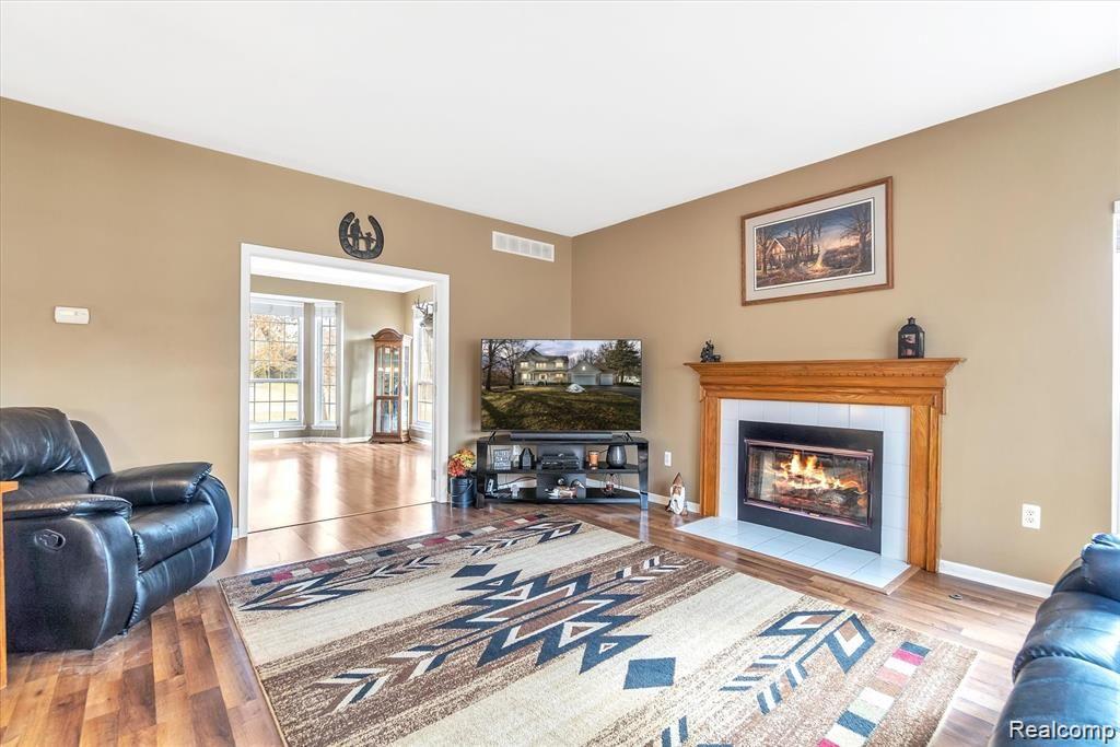 201 Timber Ridge Drive Highland, MI 48357 - Photo 9 of 39 Family room with gas fireplace
