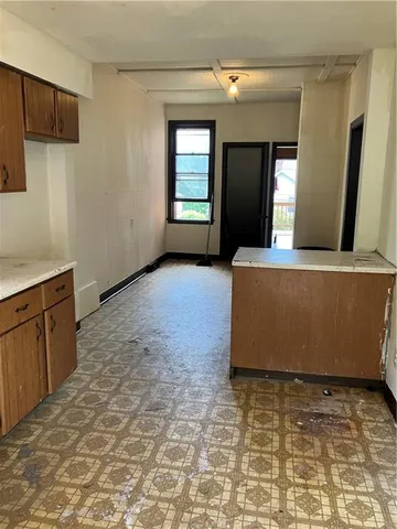 a view of a storage & utility room in a house