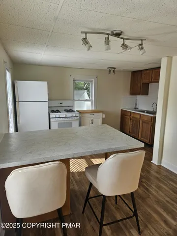 a view of a dining room with furniture