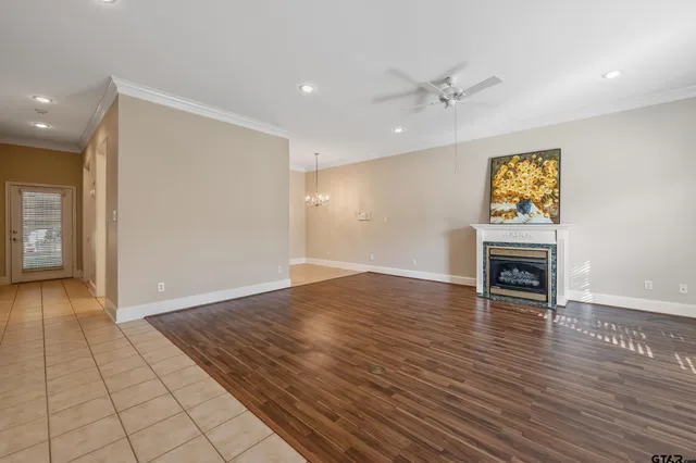 a view of livingroom with hardwood floor and fireplace