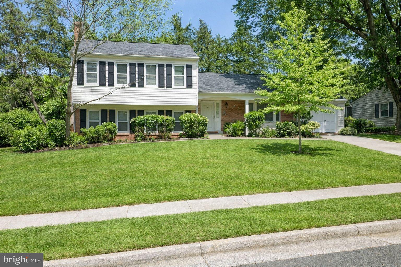 7910 Richfield Road Springfield, VA 22153 - Photo 1 of 14 a front view of a house with a yard