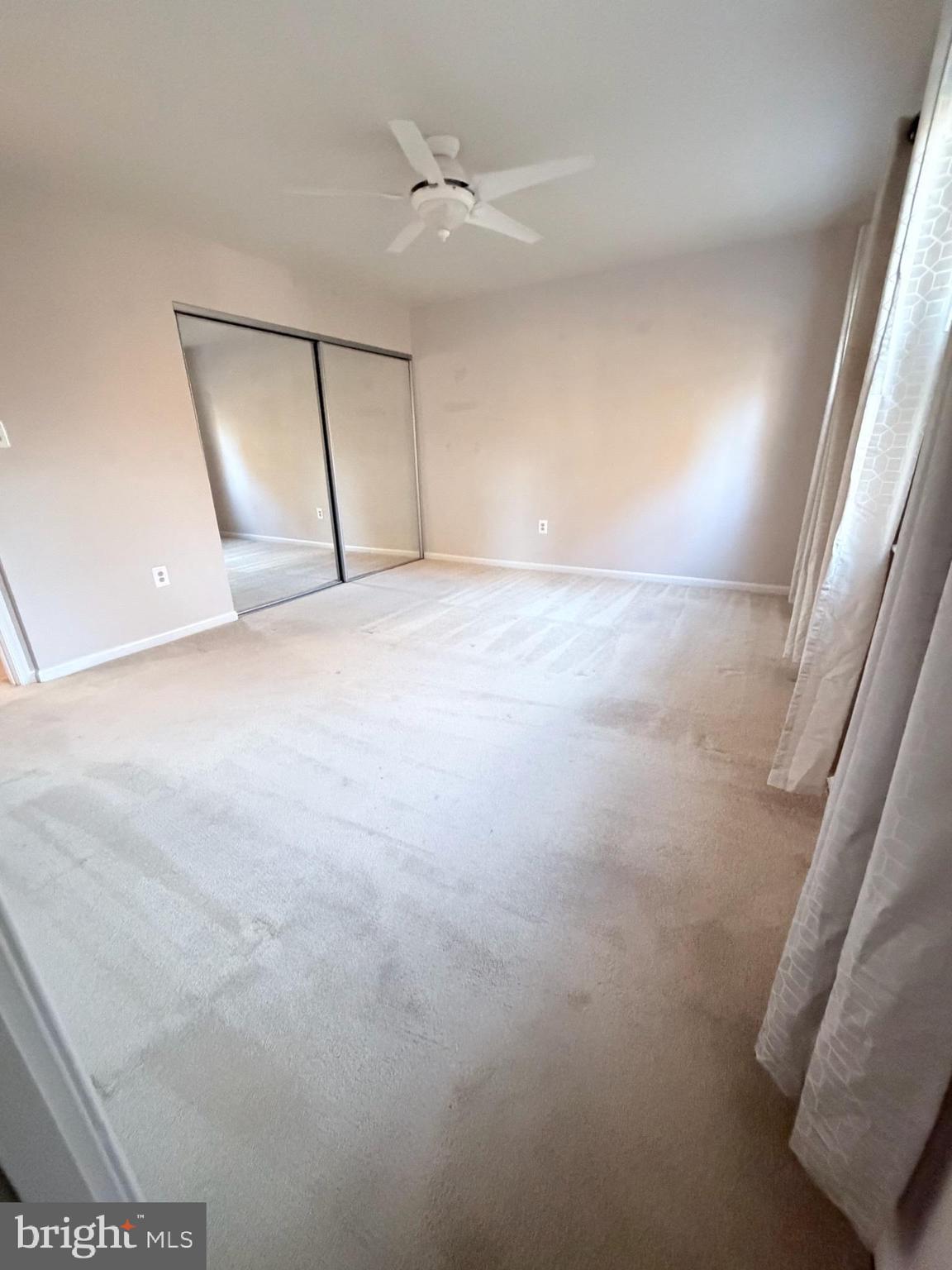 7910 Richfield Road Springfield, VA 22153 - Photo 11 of 14 a view of an empty room with a window