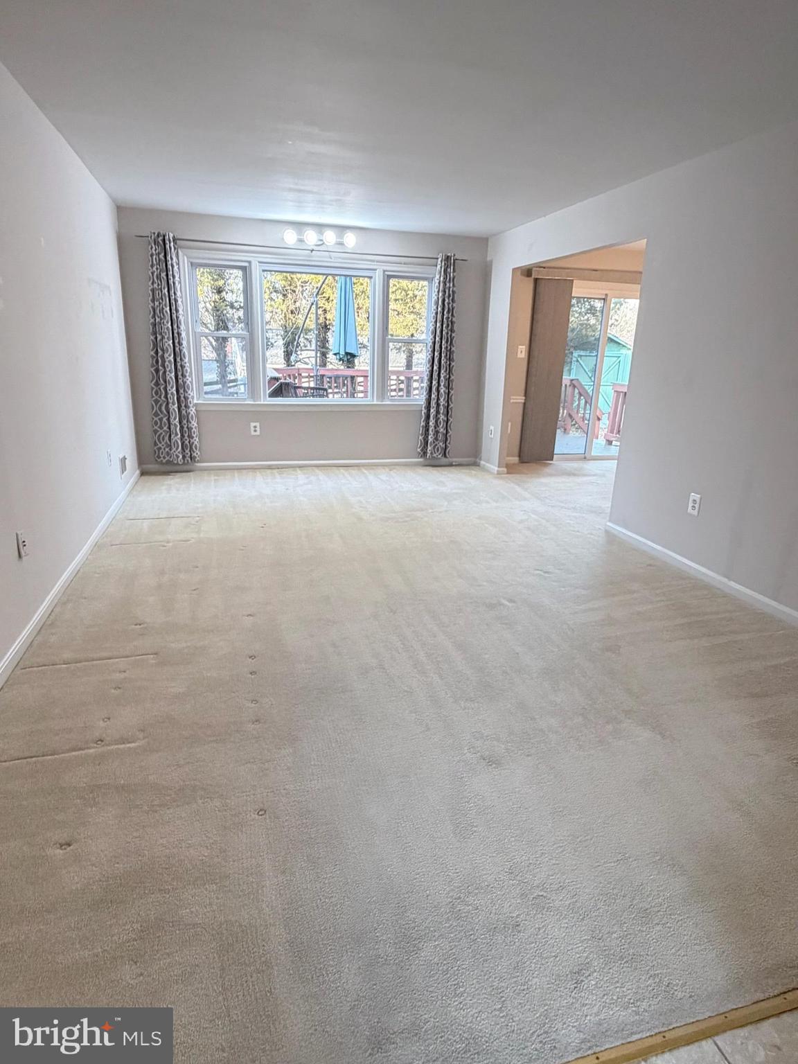 7910 Richfield Road Springfield, VA 22153 - Photo 12 of 14 an empty room with windows